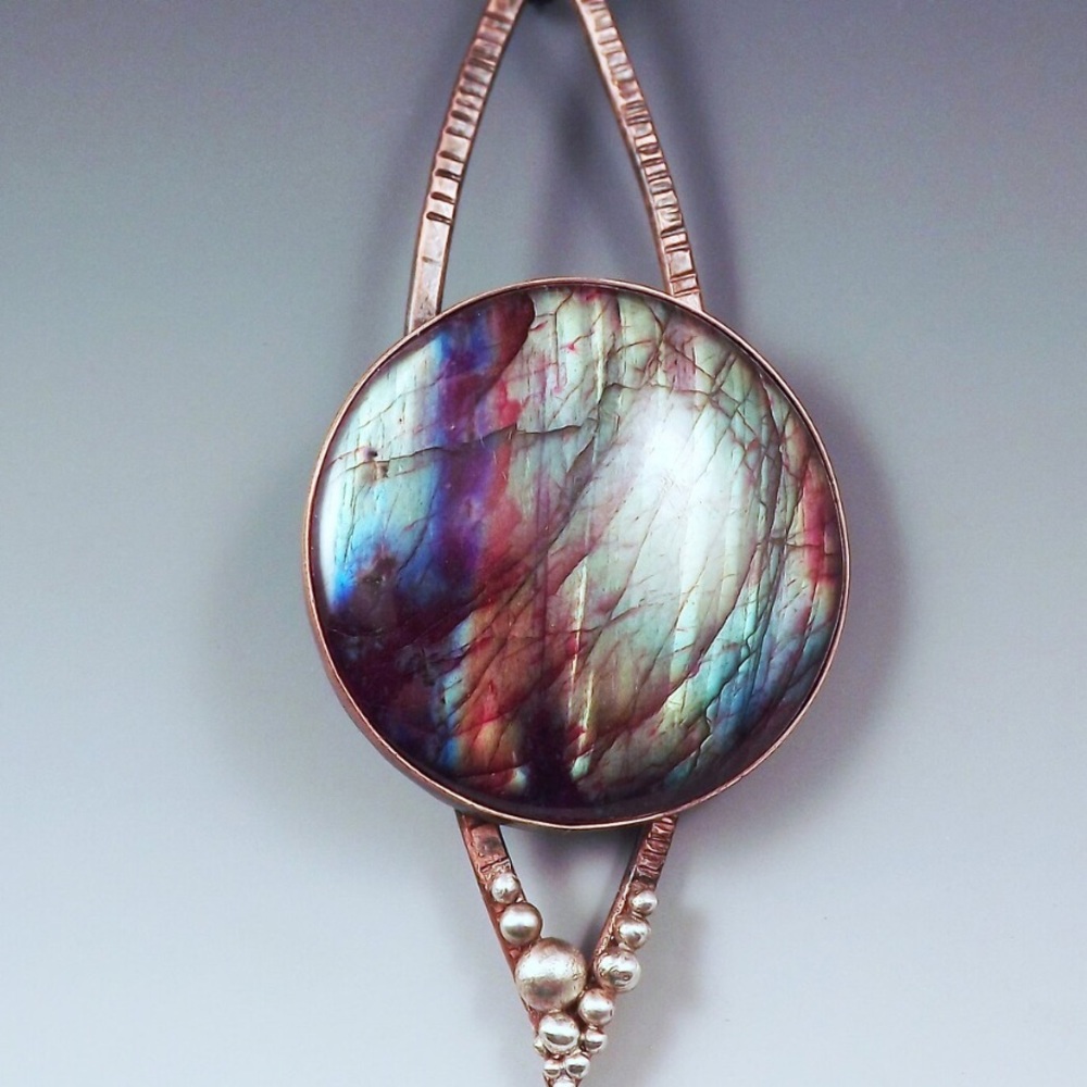 Patrician art spectrolite pendant with soldered silver balls on crossed “twigs”